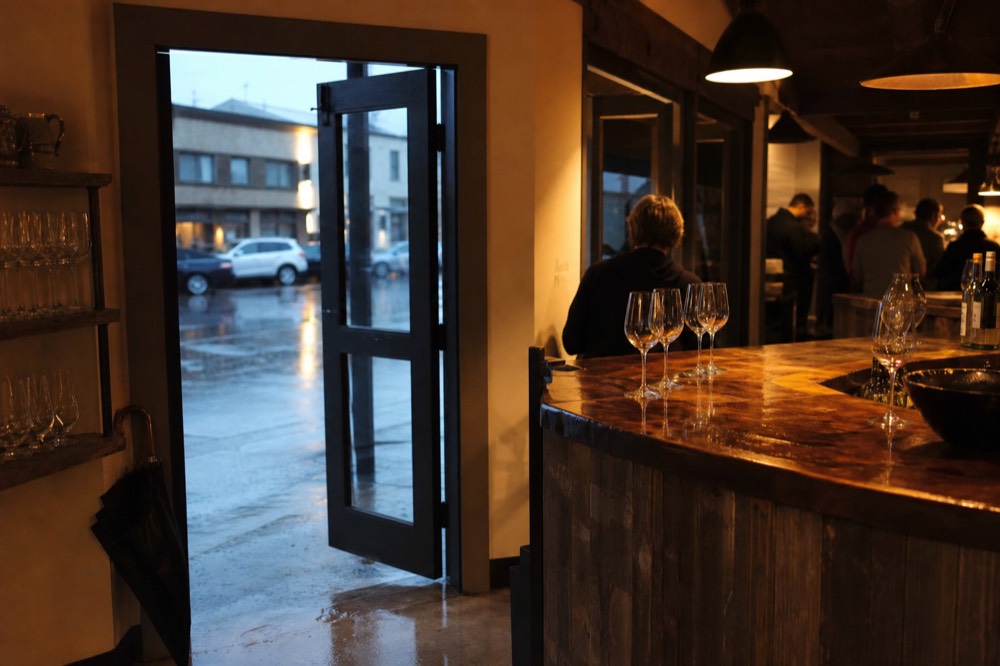 Small-production tasting room bar in downtown Healdsburg, no text, no logos, no people