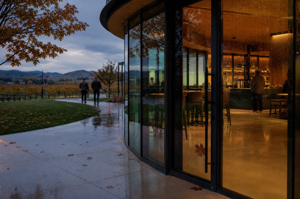 Aperture Cellars' modern circular building with glass walls, no text, no logos, no people